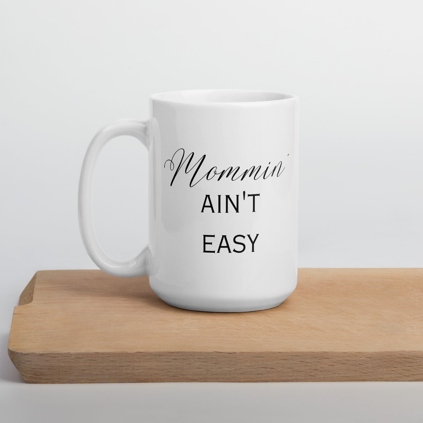 Mommin Ain't Easy Elegant White glossy mug