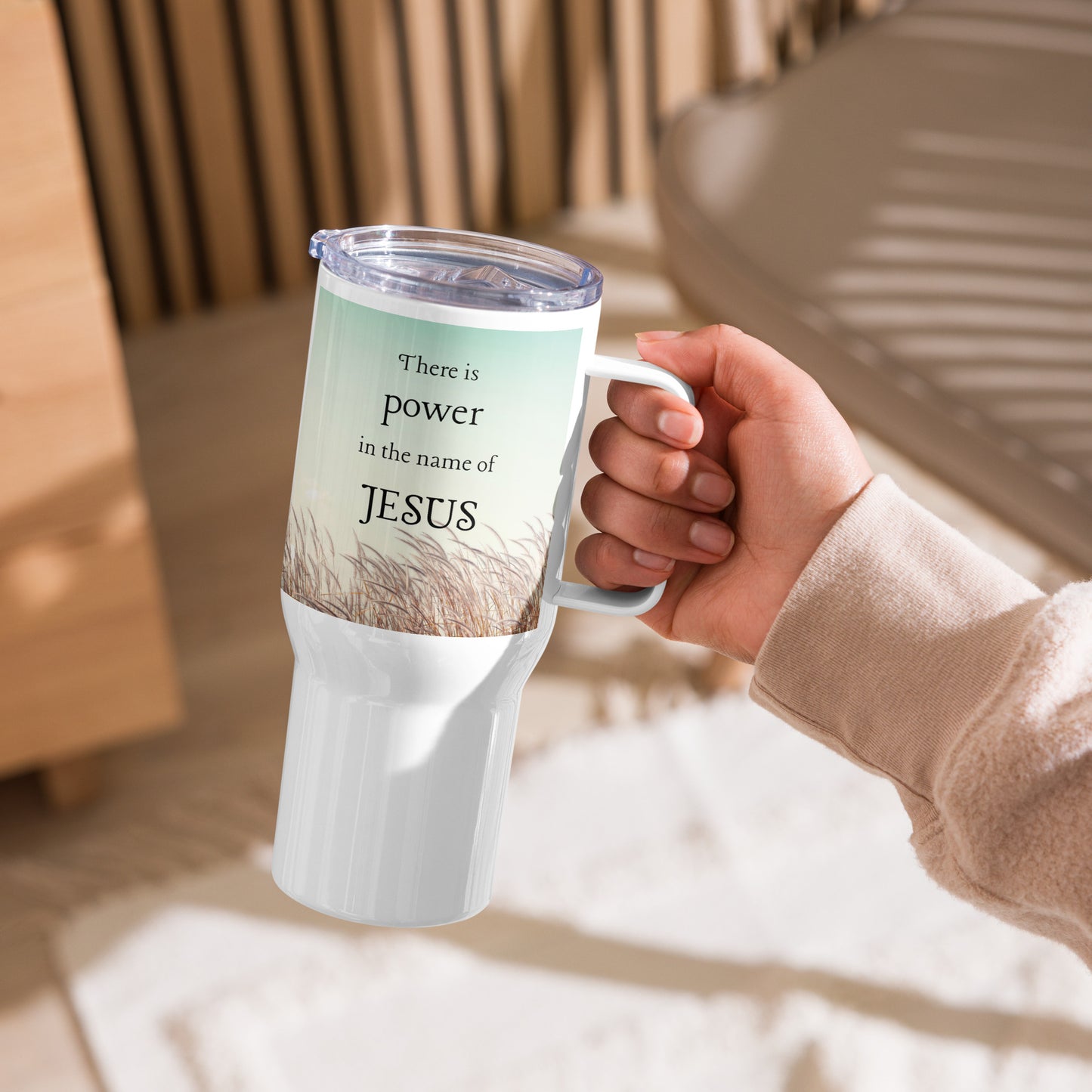 There is power in the name of Jesus Travel mug with a handle