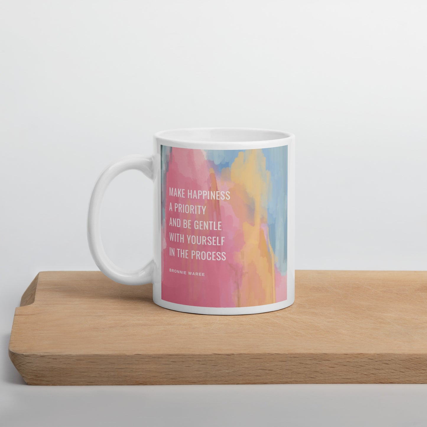 Make happiness a priority White glossy mug
