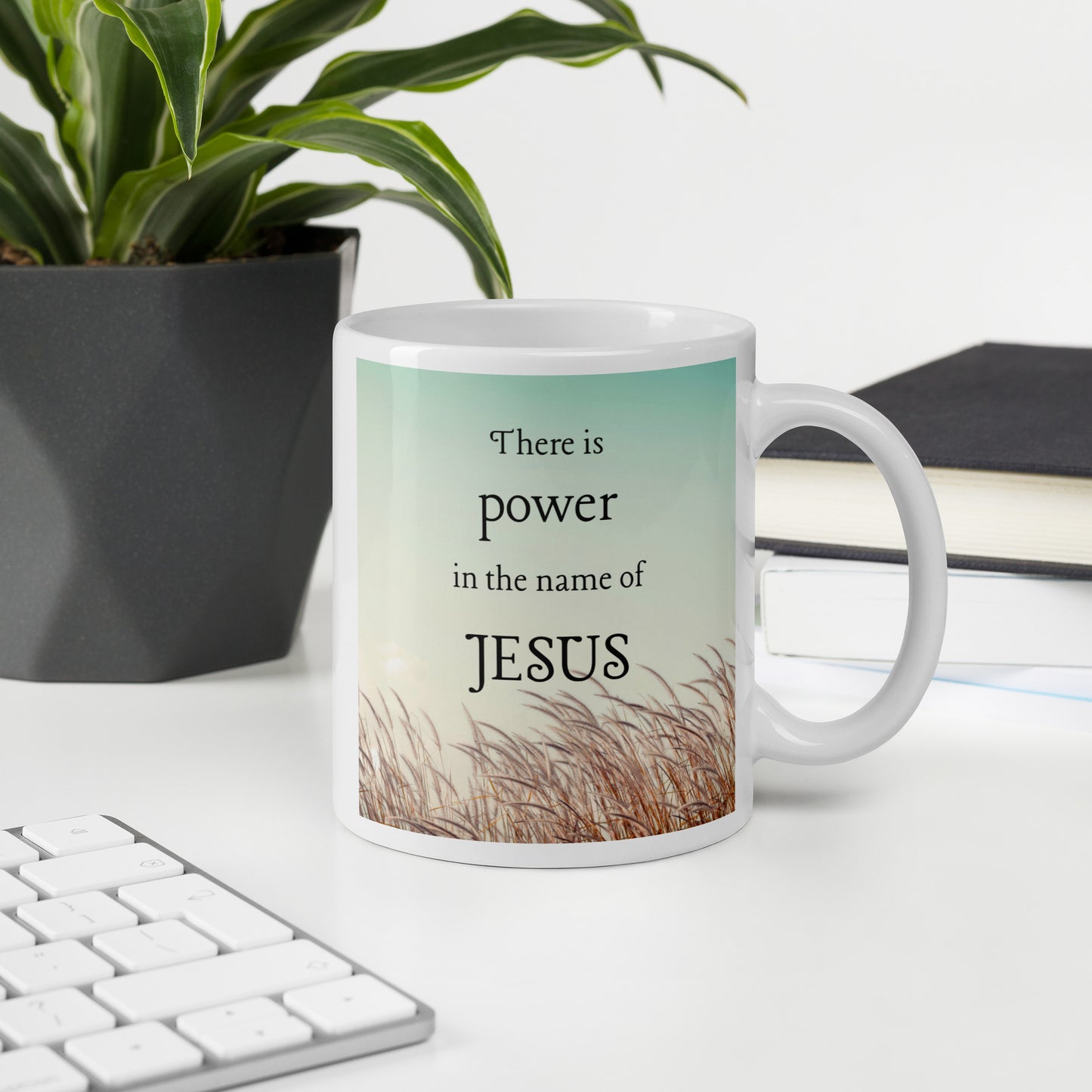 There is power in the name of Jesus White glossy mug