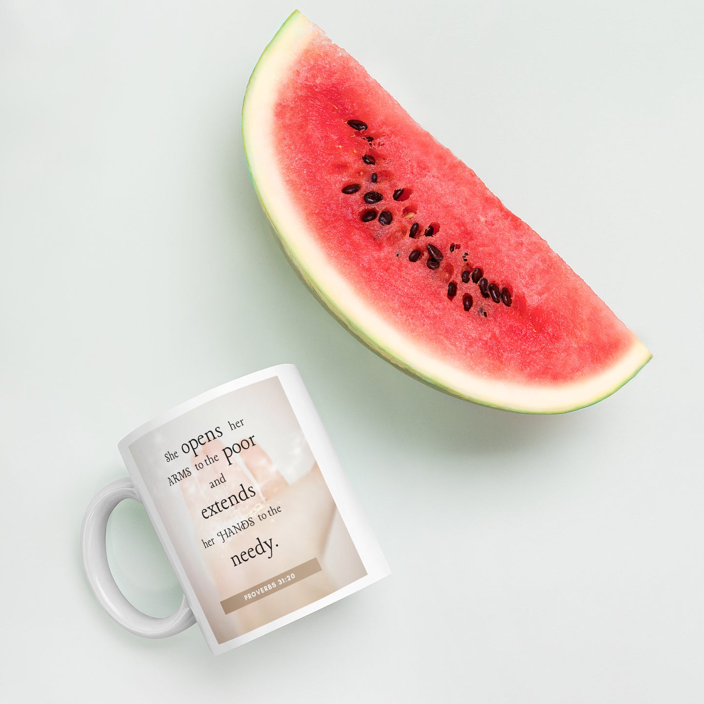 Proverbs 31:20 White glossy mug