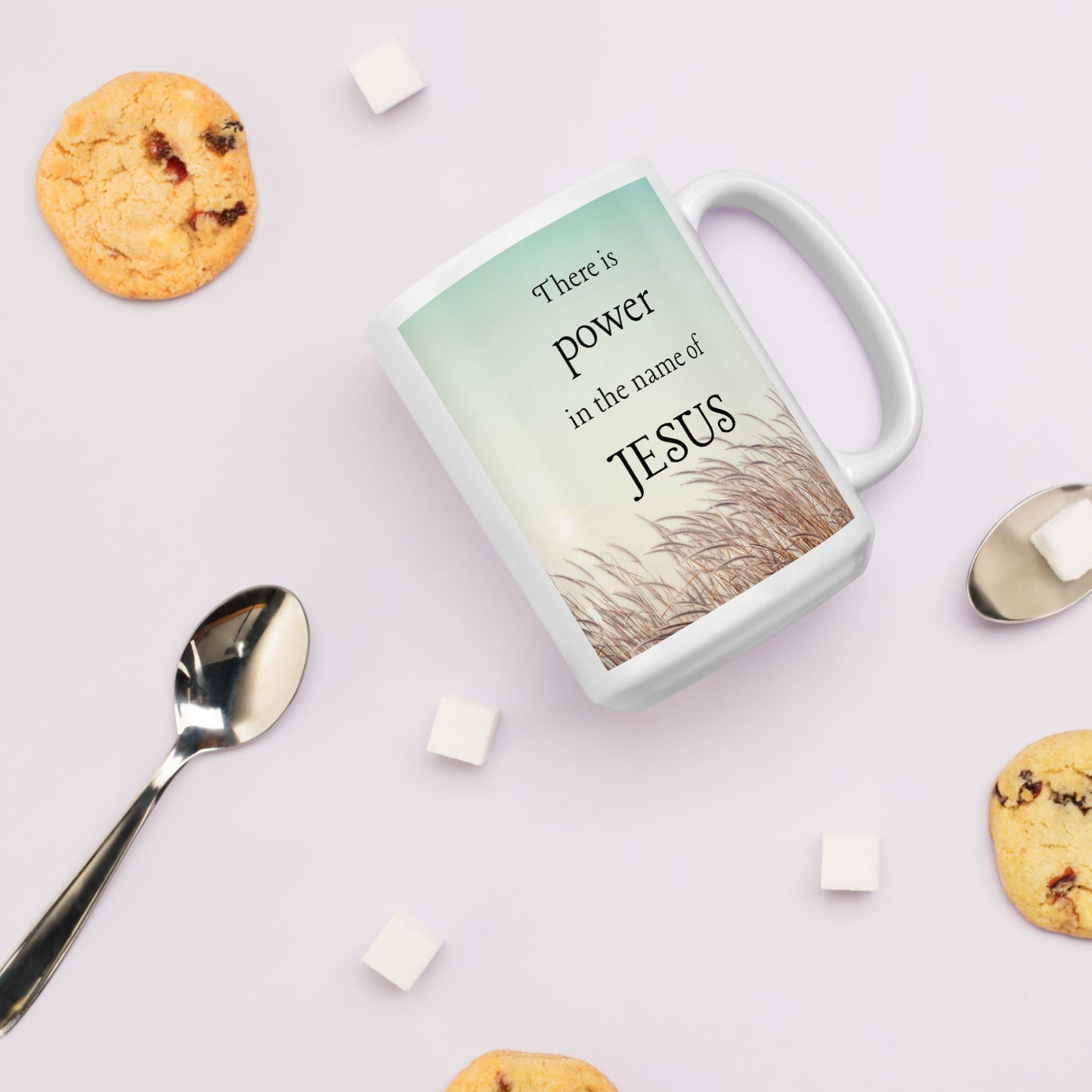 There is power in the name of Jesus White glossy mug