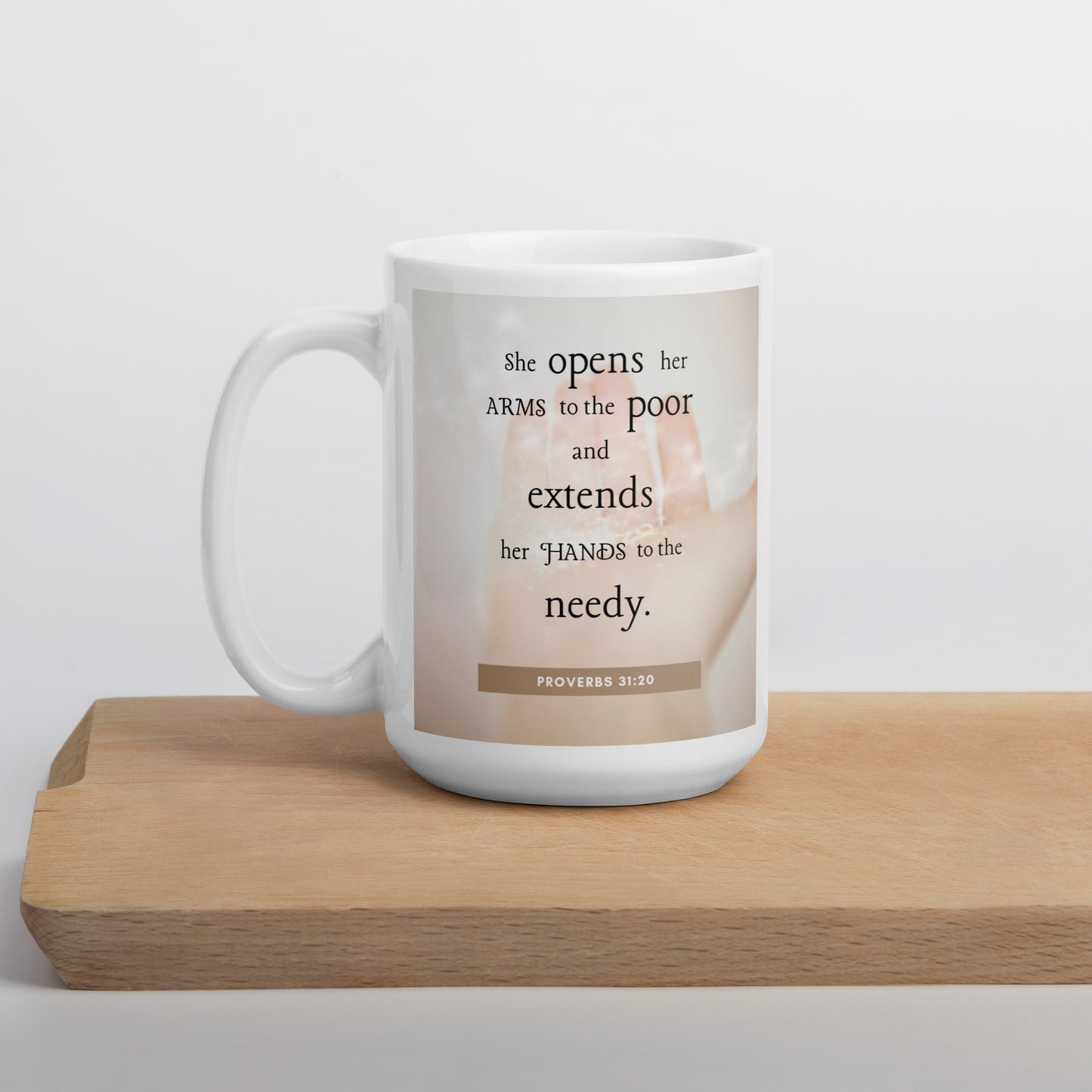 Proverbs 31:20 White glossy mug