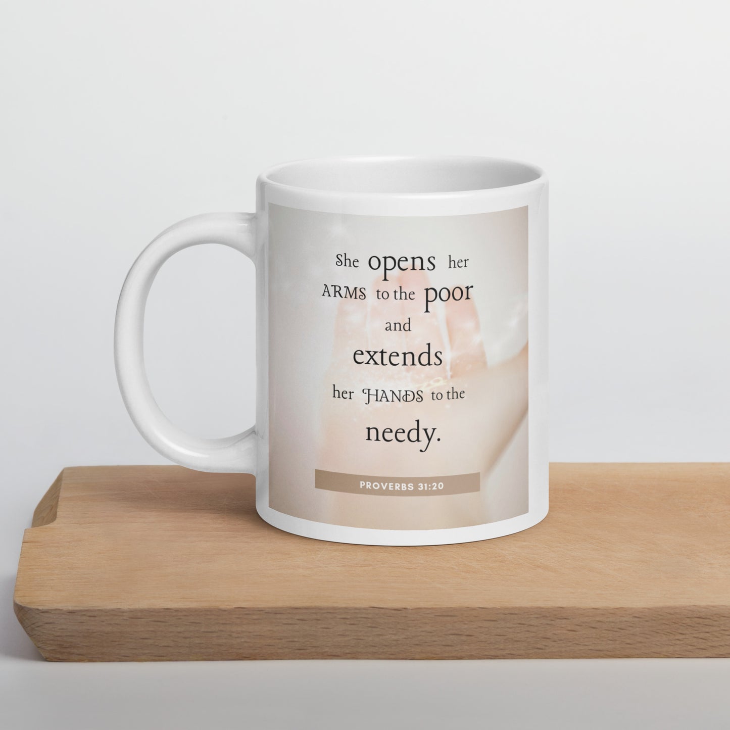 Proverbs 31:20 White glossy mug