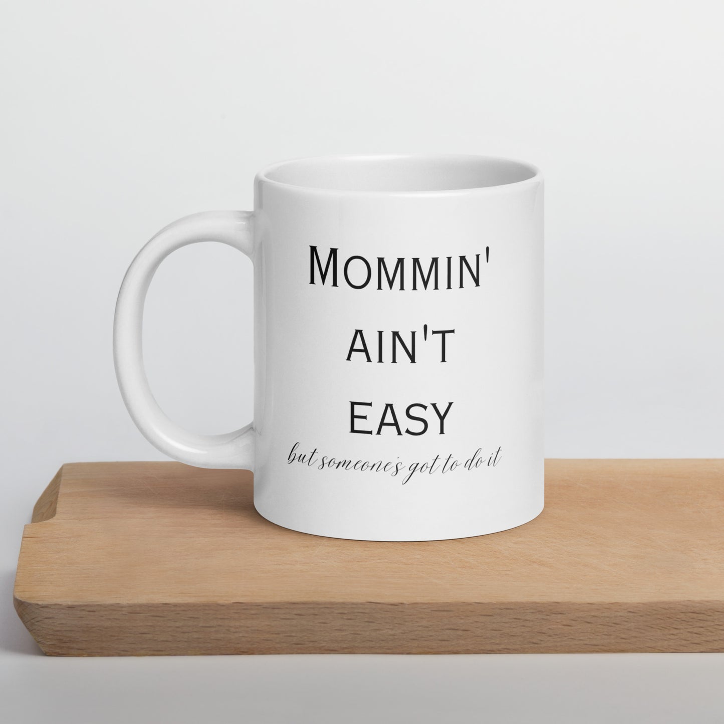 Mommin Ain't Easy Bold White glossy mug